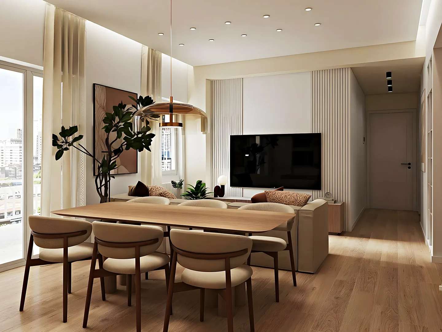 Salón-comedor de un piso reformado en Málaga con suelo claro y mucha luz